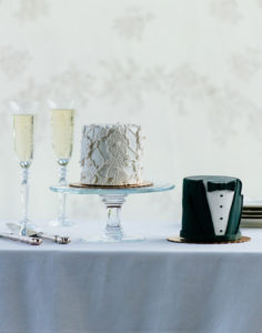 The Mad Hatter's The Lovely Couple Wedding Cake. Two small cakes modeled after a bride an groom.