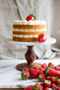 A Strawberry Shortcake with strawberry filling and whipped cream.
