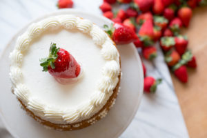 A Strawberry Shortcake with strawberry filling and whipped cream.