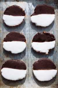 The Mad Hatter's Black & White Cookies on a baking sheet.