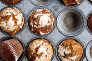 The Mad Hatter's Scratch Made Muffins in a muffin tray.