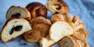 Assorted croissants from Mad Hatter's Durham Bakery, including chocolate-filled and plain