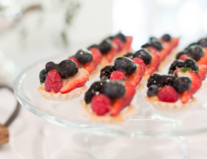 Fruit tarts with fresh berries from Mad Hatter's dessert catering in Durham